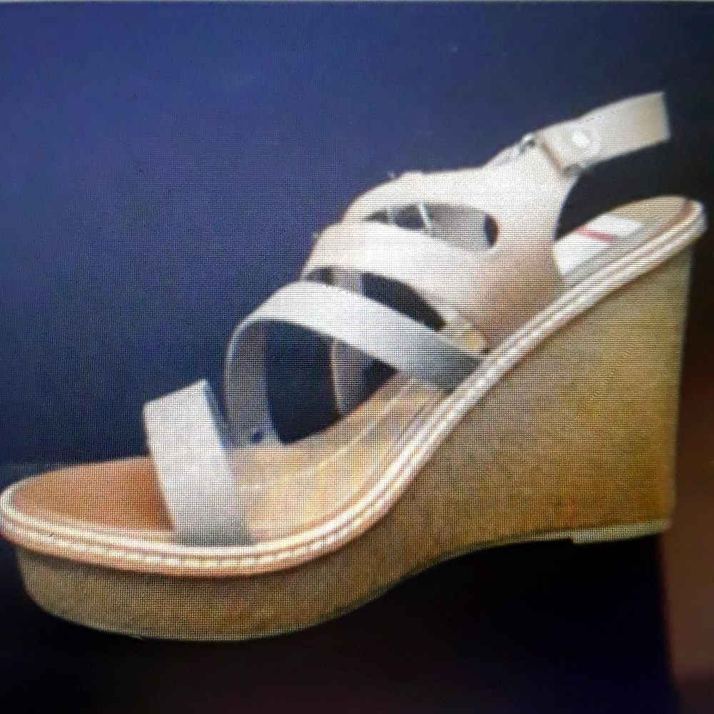 DOLCE VITA  New sandals wedges.  Really nice.and never worn.